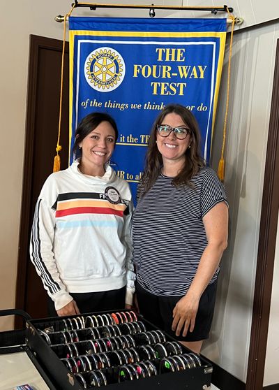 Main Street Kirksville Executive Director Laci Cook and VP Chade Shorten Rotary Luncheon