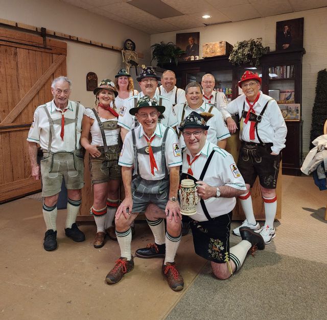 Polka band at Oktoberfest in Nauvoo wearing authentic German Lederhosen 