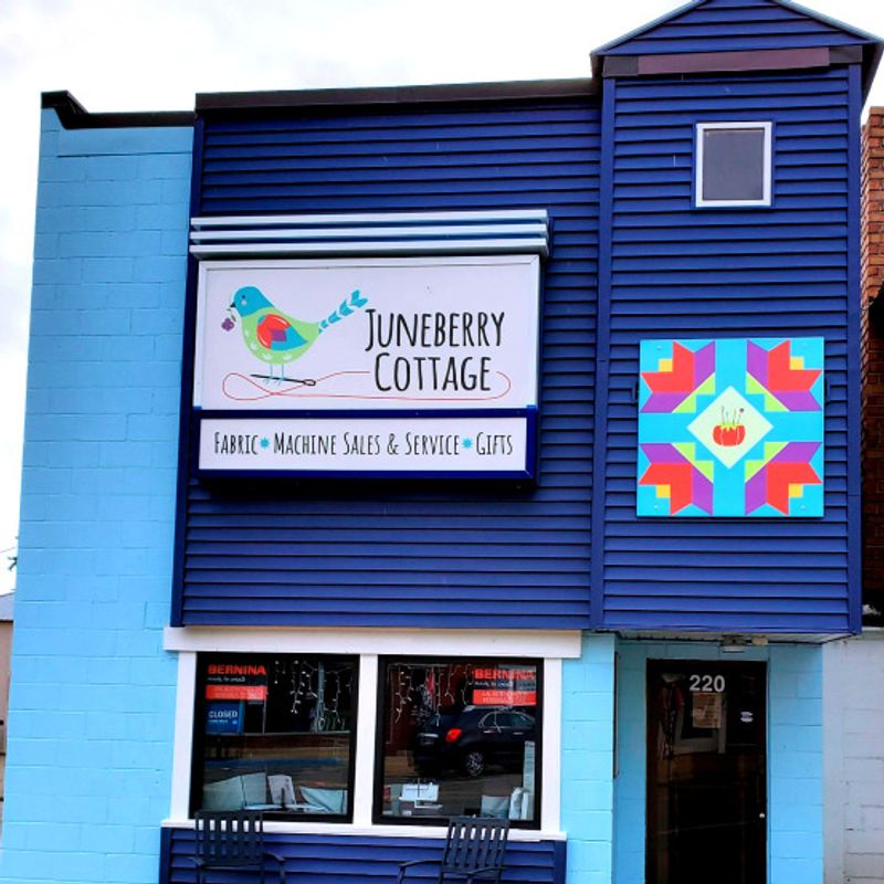 Juneberry Cottage is in the quaint little town of Evart, Michigan, located along US 10 just 12 miles east of US131 and 30 miles west of US 127.   We are a specialty quilt shop and authorized Bernina dealer.