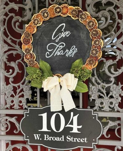 Wreath made with dehydrated citrus with words "Give Thanks" 