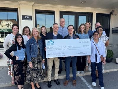 Walnut House property enhancement grant check presentation with Main Street board of directors
