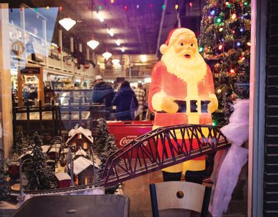 Vintage Santa in storefront in Athens