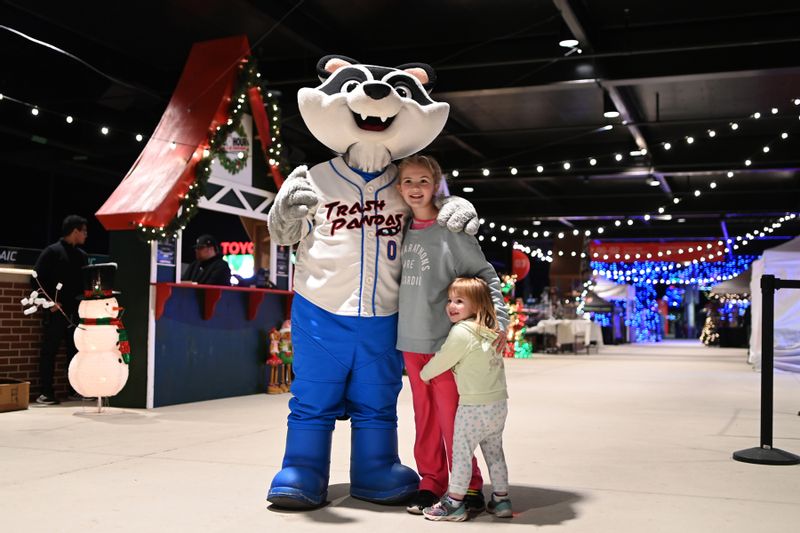 Kids photo op with Trash Panda mascot