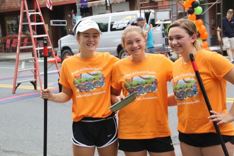 Student volunteers at the Bridge of Flowers race