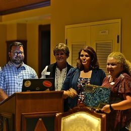 Main Street Alabama 2019 Awards Treasurer Shannon Tierney accepting the Award of Excellence in Promotions for Lucky to Love Foley event Presented by State Director Mary Helmer, Foley Main Street President Chad Watkins and Executive Director Darrelyn Dunmore 