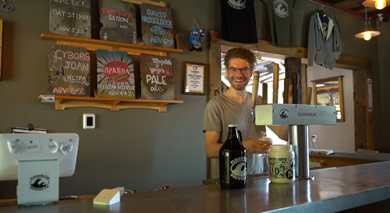 Zach behind the bar at Floodwater Brewery