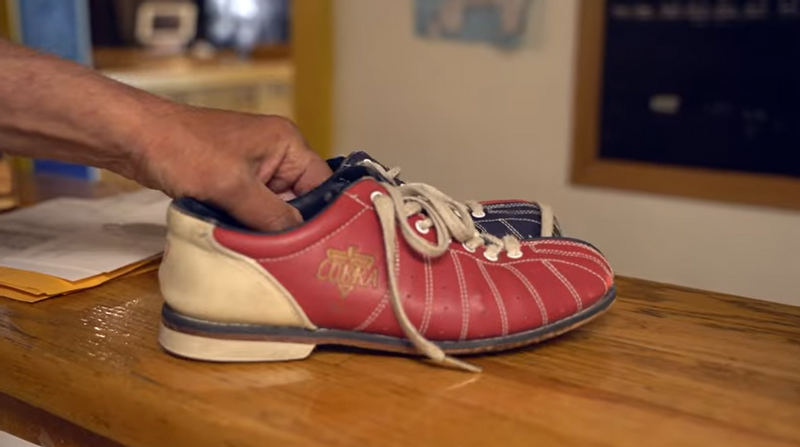 Bowling shoes on a counter