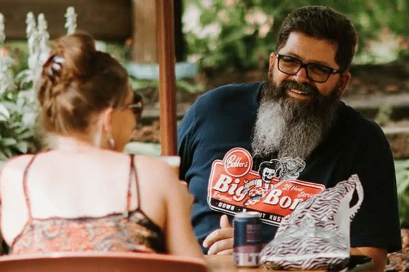 Guests enjoy drinks and conversation at Juniper’s outdoor seating area in Lanesboro, Minnesota.