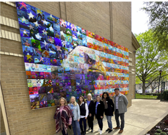 Mosaic Mural Bald Eage with people in front