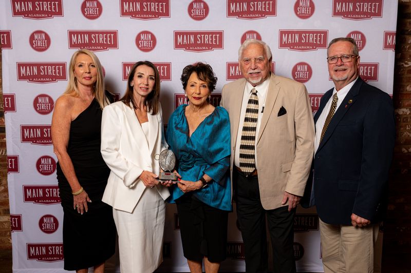  Hollis Interiors won an Awards of Excellence in Historic Preservation Award Pictured Kelly Hollis, Tootsie Hollis-Allen  Carolyne & Wayne Hollis and Mayor Ralph Hellmich.  