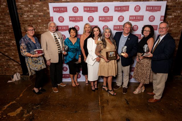 Left to Right: Foley Main Street had a great representation at the Main Street Alabama Annual Awards Banquet. Foley Main Street Executive Director Darrelyn Dunmore, Wayne and Carolyne Hollis, Kelly Hollis, Tootsie Hollis-Allen, Chloe Salinas Foley Art Center Director, Wayne Dyess City of Foley Executive Director of Planning and Infrastructure, Foley Main Street Board member Kristin Hellmich and City of Foley Mayor Ralph Hellmich.