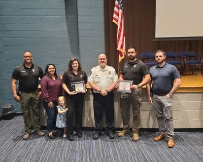 Pictured following the graduation ceremony are Statesville Police Department Sgt. Jeffrey Porter and Cpl. Jessica Osborne with Chief David Onley, fellow officers, and family members after successfully completing the National Polygraph Academy's 400-hour Basic Polygraph Examiner Program. Their specialized training strengthens the department's investigative capabilities and reflects SPD's continued commitment to professional excellence and public safety.