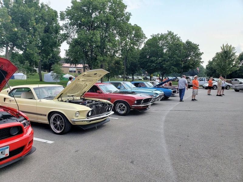 Car show in the parking lot of Lanesboro's Sylvan Park during Buffalo Bill Days