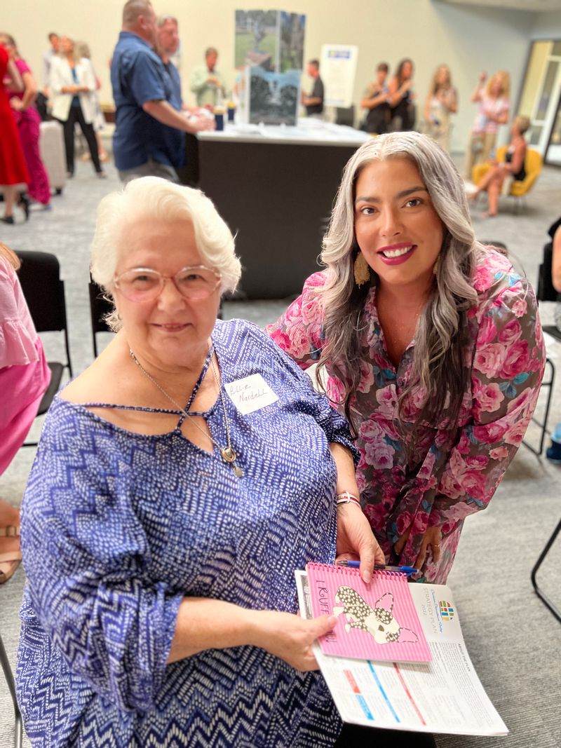 Billie Nardell with the Baldwin Historical Society and Chloe Salinas Director of the Foley Art Center 