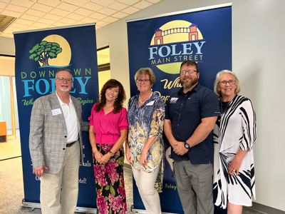 Pictured: Mayor Ralph Hellmich, Brenda Marie Coulton owner Colt Grill BBQ & Spirits, Darrelyn Dunmore Executive Director Foley Main Street, Chad Watkins President of Foley Main Street, and Donna Watts President CEO of the South Baldwin Chamber of Commerce.