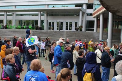 PMG PHOTO: MARK MILLER – Dozens rally outside the Hillsboro Civic Center on Friday morning, Sept. 20, in support of climate action.