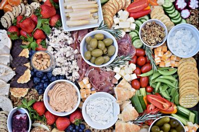 Charcuterie Board with cheese, olives, fruit, nuts, etc.