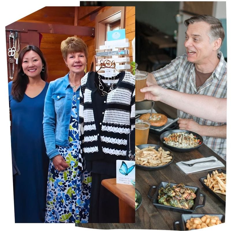 Two women standing inside a downtown Lanesboro boutique with clothing and accessories on display alongside a man enjoying food and drinks at a local Lanesboro restaurant table