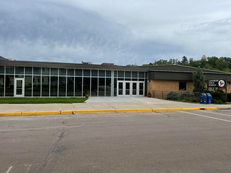 Lanesboro Public Schools building in downtown Lanesboro, Minnesota, showing the main entrance and modern glass facade serving local education and childcare needs