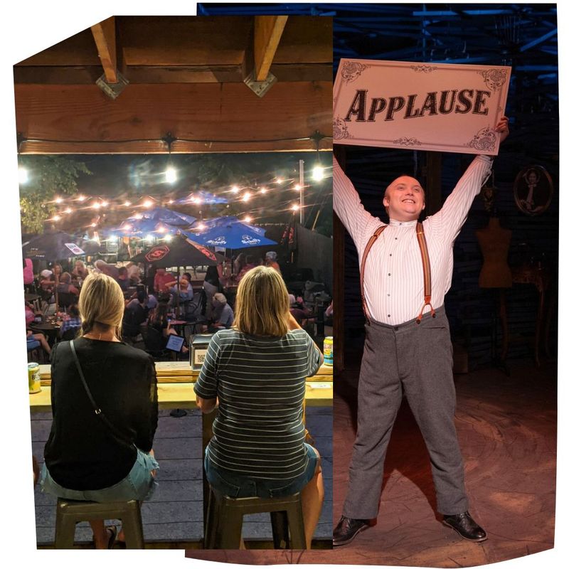 Outdoor patio with string lights and evening crowd in downtown Lanesboro alongside theater performer holding an “Applause” sign – Entertainment & Nightlife webpage