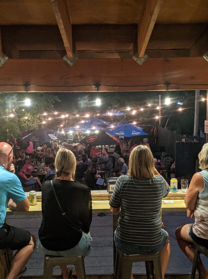 Scene of live music from the back patio of the High Court Pub in Lanesboro, MN