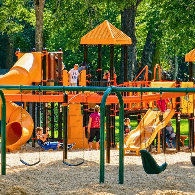 Kids playing at the playground at Sylvan Park in Lanesboro, MN