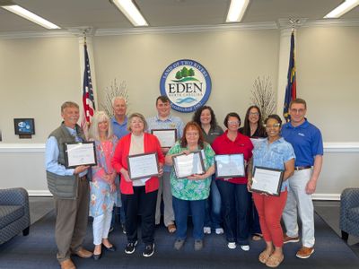 The winners of the Energize Eden Grant and (far right) Hank Henning from Duke Energy.