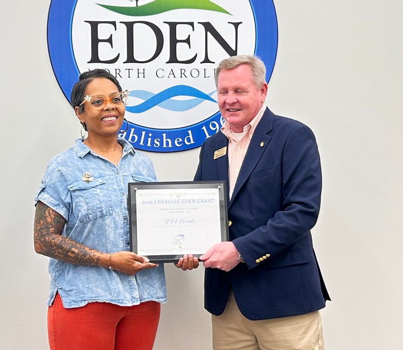April Blackstock accepting her award with Randy Hunt.