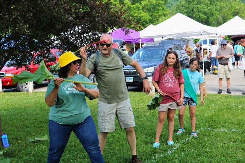 Festival-goers take part in rhubarb-themed games during Lanesboro’s Rhubarb Festival in Sylvan Park.